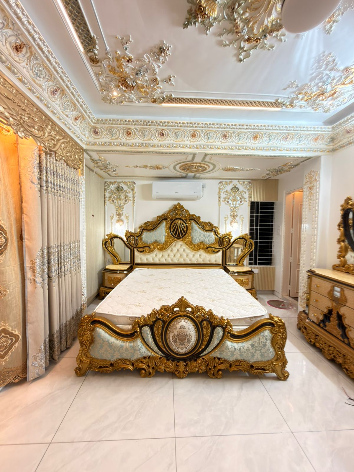 Gold-finished classic bedroom suite fitted by Midpoint in Dhaka